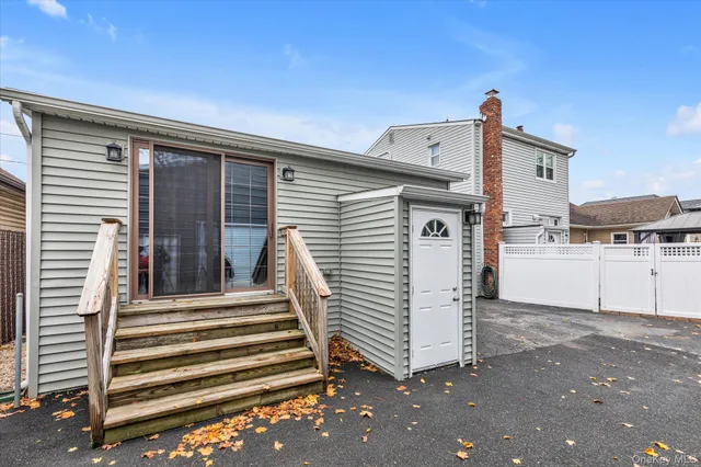 a view of a house with a white door