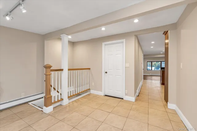 a view of a hallway with entryway