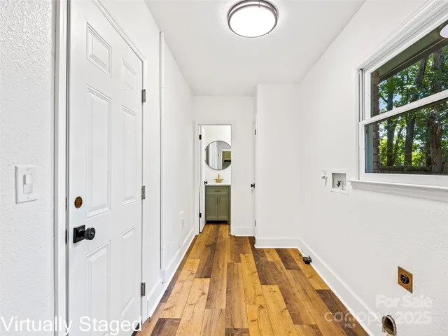 a view of a bathroom from the hallway