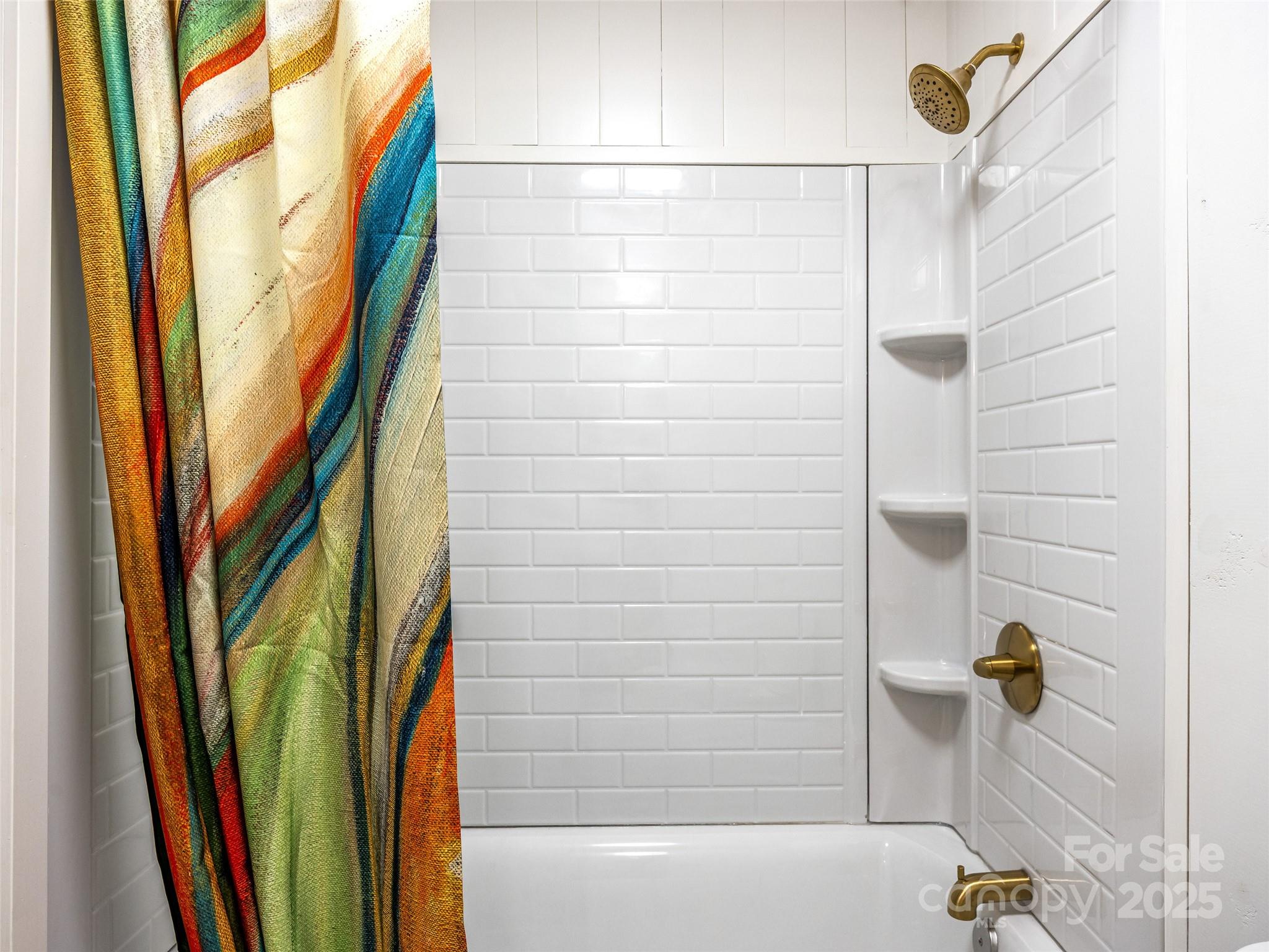 10 Westfield Road Fletcher, NC 28732 - Photo 28 of 45 a bathroom with a shower and a bathtub