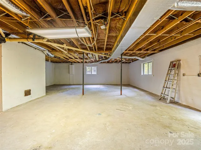 a view of a room with wooden walls