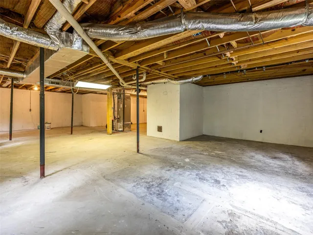 a view of a room with wooden walls