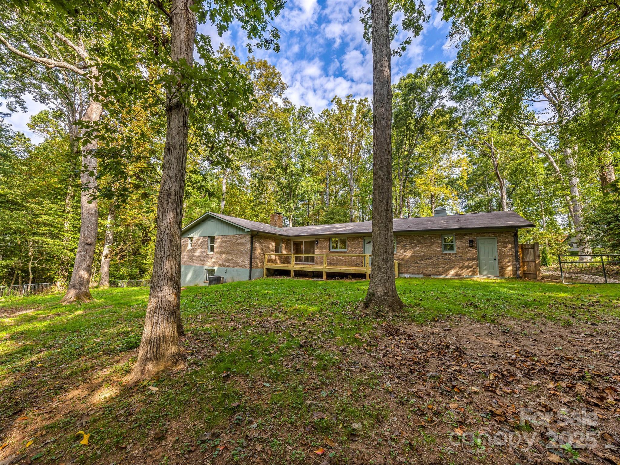 10 Westfield Road Fletcher, NC 28732 - Photo 42 of 45 a view of a house with backyard and garden