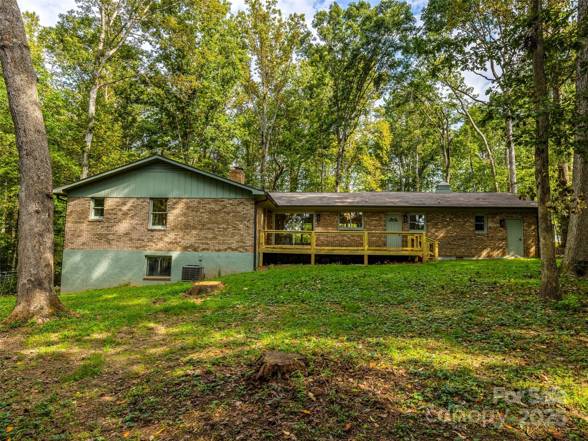 10 Westfield Road Fletcher, NC 28732 - Photo 43 of 45 a view of a house with a yard
