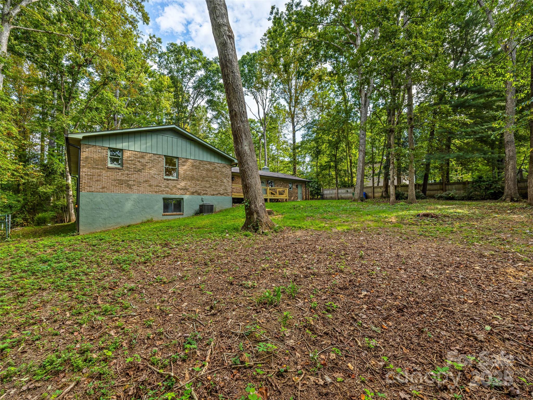 10 Westfield Road Fletcher, NC 28732 - Photo 44 of 45 a view of a house with a yard