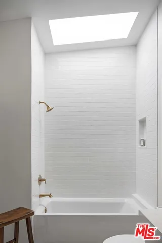 a bathroom with a bathtub