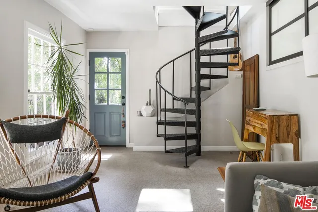 a view of livingroom with furniture and windows