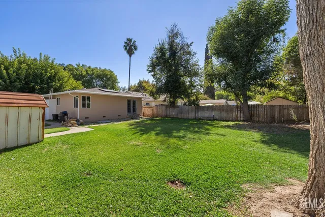 a view of a backyard with a garden