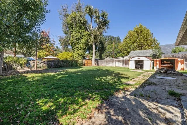 a house view with a garden space