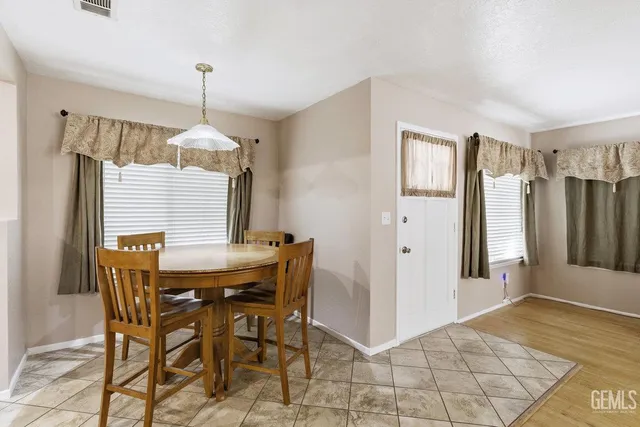 a view of a dining room with furniture