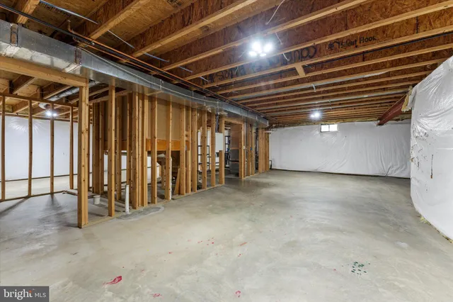 a view of an empty room with stairs