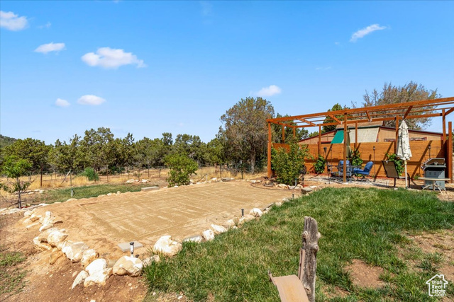 11450 Pigeon Hollow Road Spring City, UT 84662 - Photo 35 of 47 View of yard with a patio area and a pergola