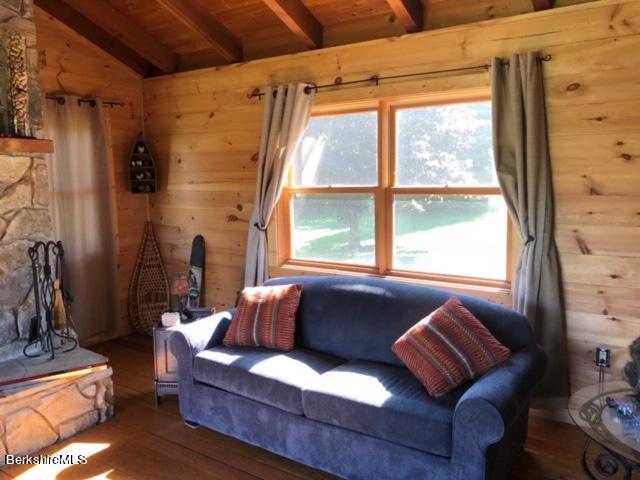 140 Arthur Pease Road Middlefield, MA 01011 - Photo 19 of 43 a living room with furniture and a window