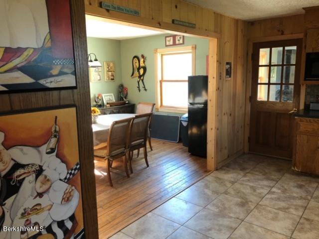 140 Arthur Pease Road Middlefield, MA 01011 - Photo 22 of 43 a view of a dining room with furniture window and wooden floor