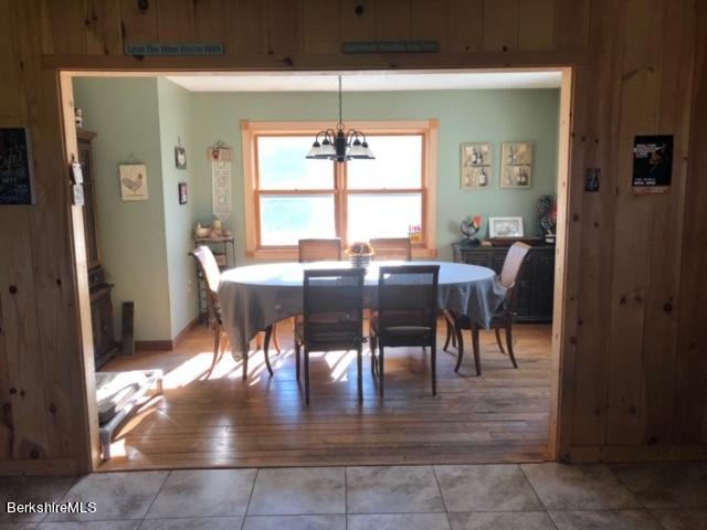 140 Arthur Pease Road Middlefield, MA 01011 - Photo 23 of 43 a view of a dining room with furniture
