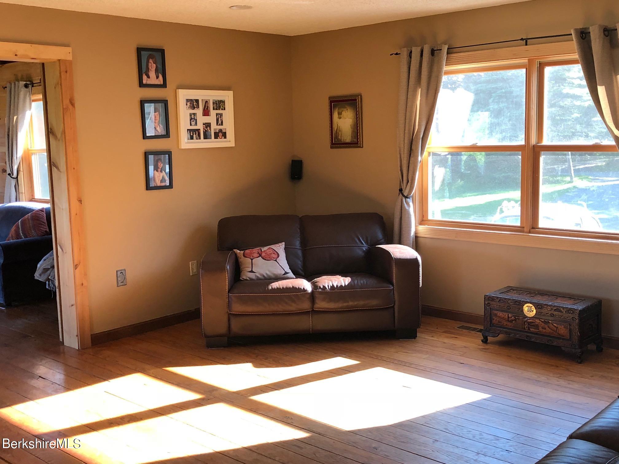 140 Arthur Pease Road Middlefield, MA 01011 - Photo 24 of 43 a living room with furniture and a window