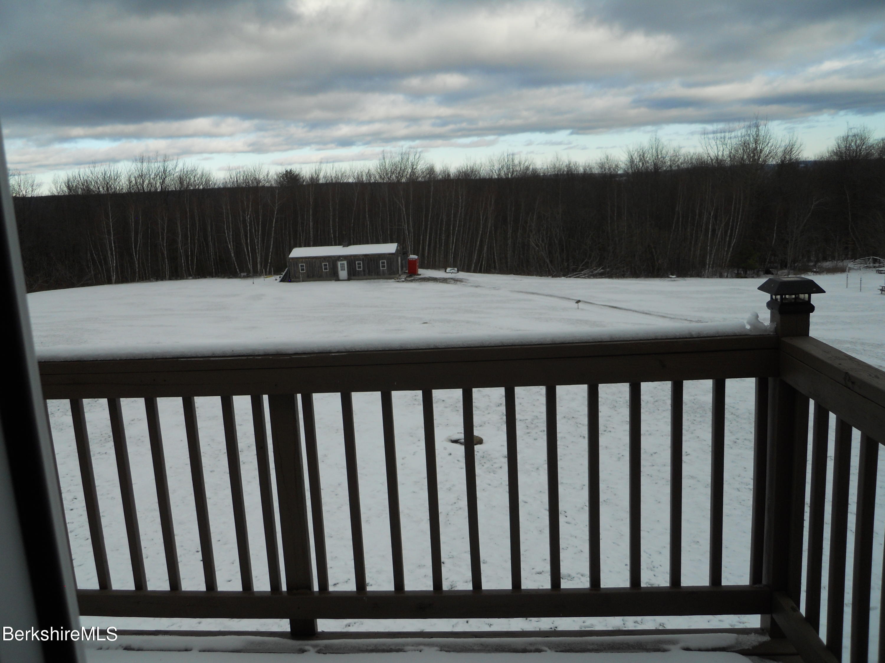 140 Arthur Pease Road Middlefield, MA 01011 - Photo 28 of 43 a view of a roof deck with wooden fence