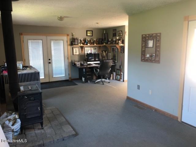 140 Arthur Pease Road Middlefield, MA 01011 - Photo 34 of 43 a view of a workspace with furniture