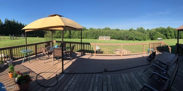 140 Arthur Pease Road Middlefield, MA 01011 - Photo 10 of 43 a view of a swimming pool with a patio
