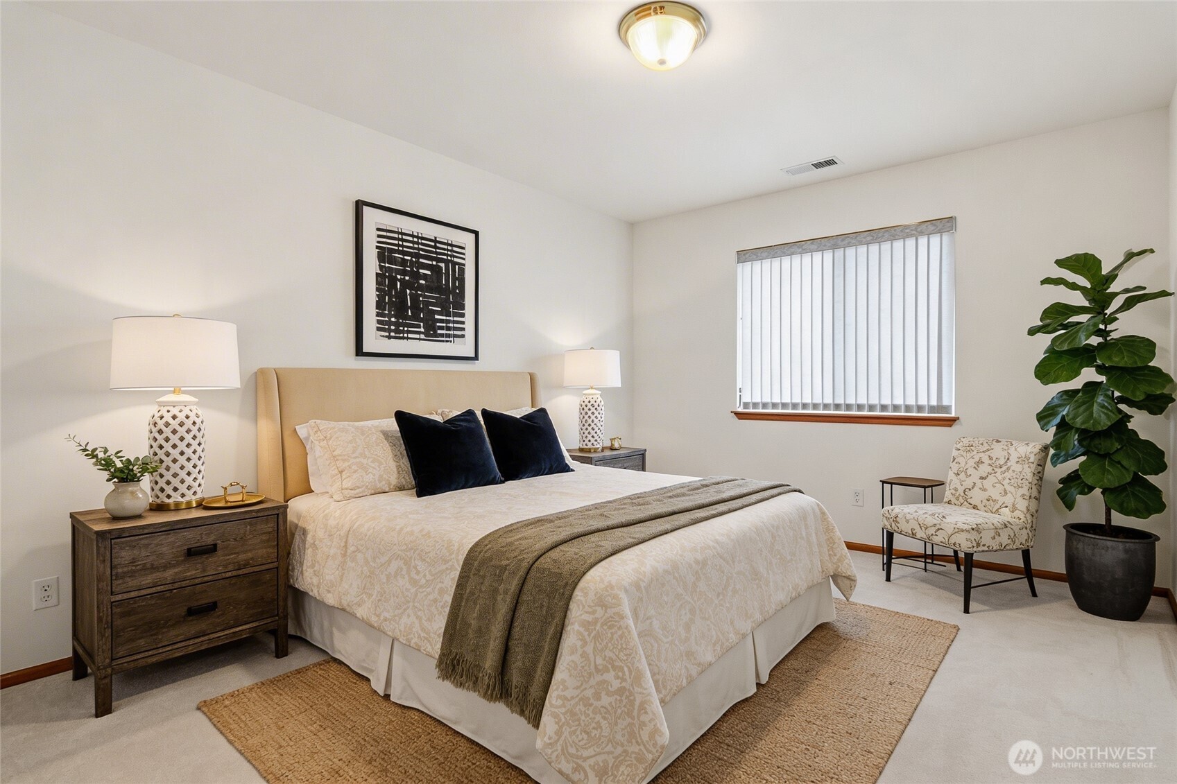 18639 175th Avenue Southeast Renton, WA 98058 - Photo 28 of 37 a bedroom with bed and a potted plant