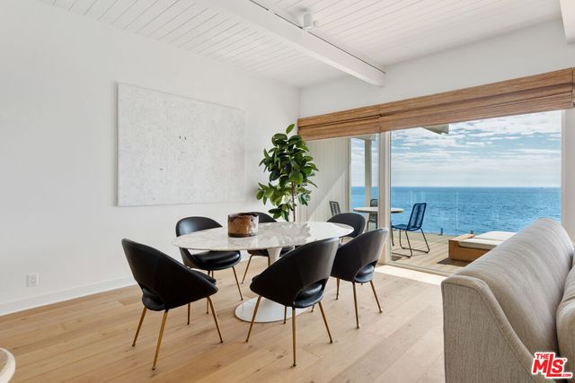 a living room with furniture and flat screen tv