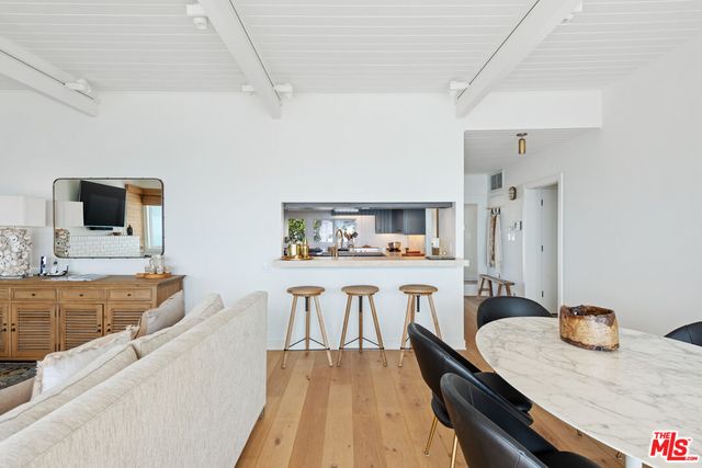 a kitchen with stainless steel appliances a sink stove and refrigerator