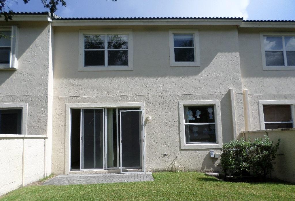 10060 Boca Palm Drive Boca Raton, FL 33498 - Photo 2 of 19 Rear View
