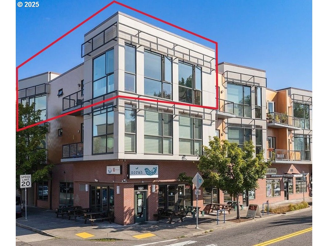 a view of a building and a street