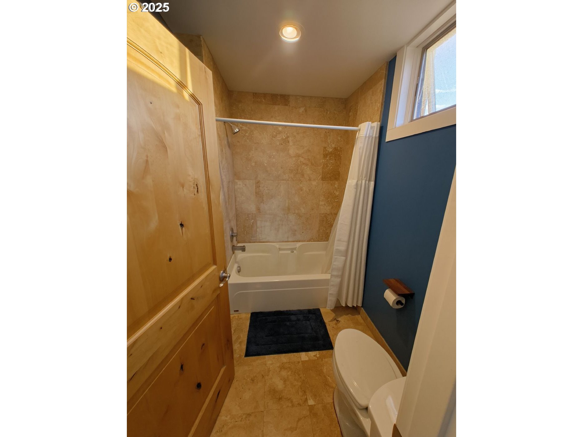 838 Southeast 38th Avenue, Unit 307 Portland, OR 97214 - Photo 14 of 16 a bathroom with a vanity and a shower