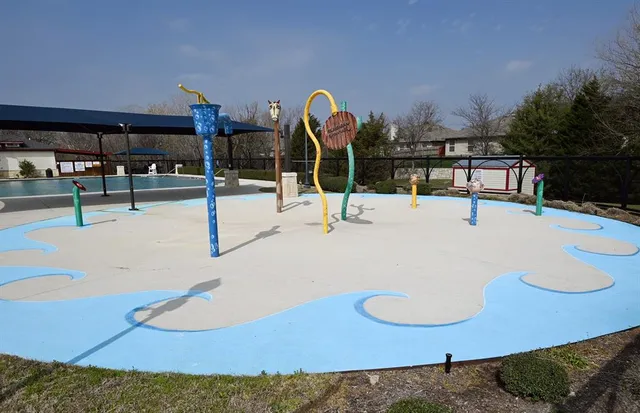 a swimming pool with view of the back