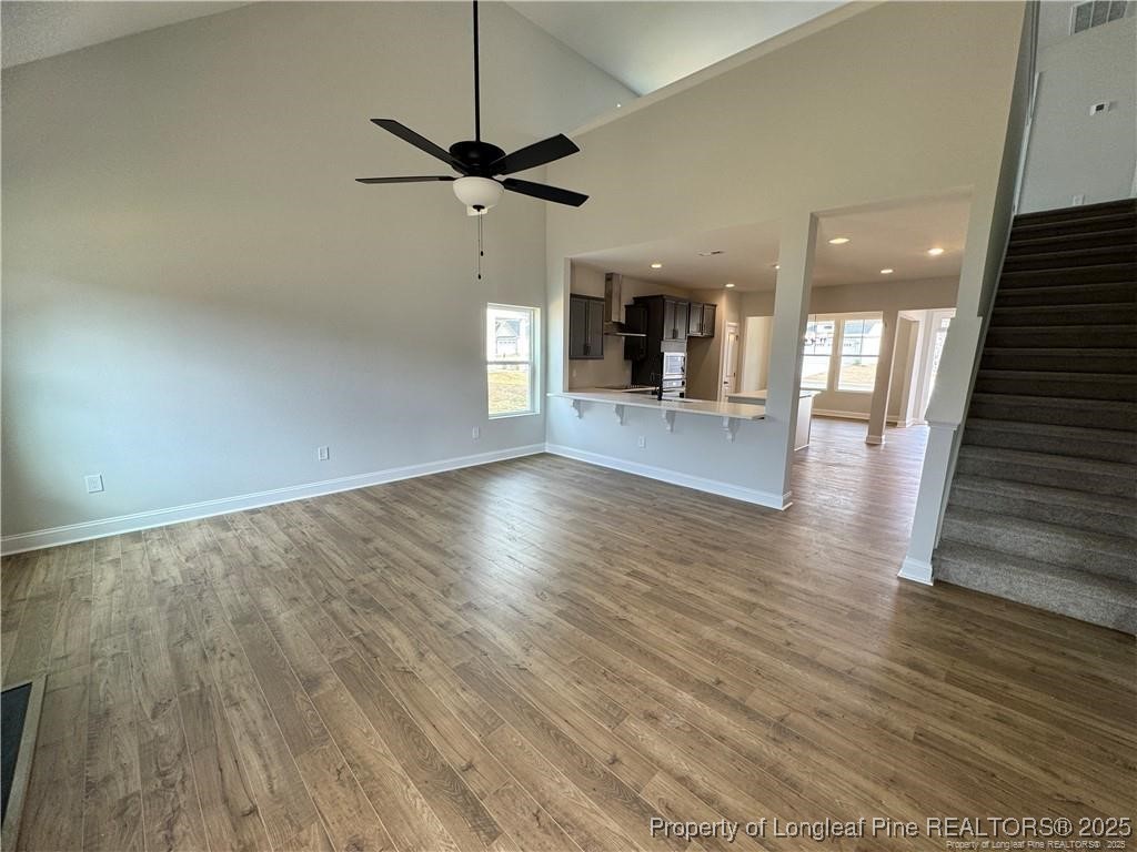 179 Grove Walk Road Raeford, NC 28376 - Photo 15 of 26 wooden floor in an empty room with a window