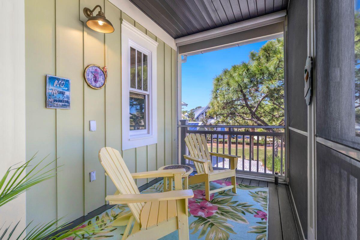 446 Jubilation Drive Port St. Joe, FL 32456 - Photo 21 of 62 a front view of a house with outdoor seating