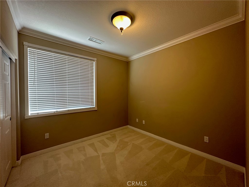5588 California Oak Street Simi Valley, CA 93063 - Photo 13 of 38 a view of an empty room with a window