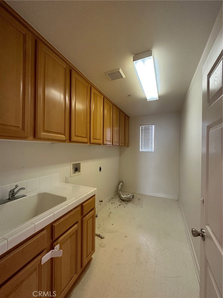 5588 California Oak Street Simi Valley, CA 93063 - Photo 19 of 38 a bathroom with a sink and a mirror