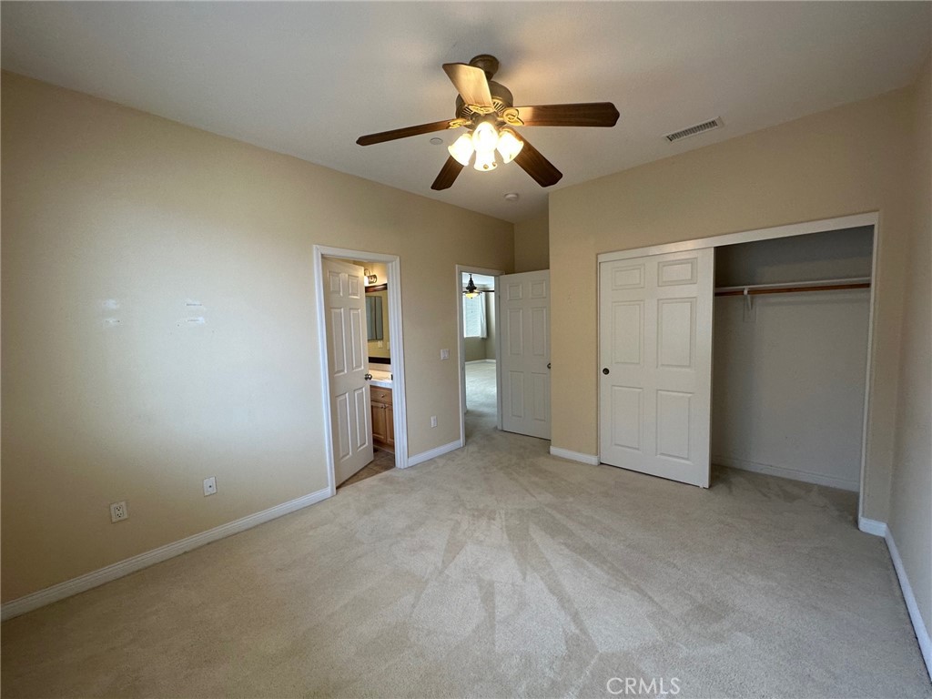 5588 California Oak Street Simi Valley, CA 93063 - Photo 25 of 38 an empty room with closet and a ceiling fan