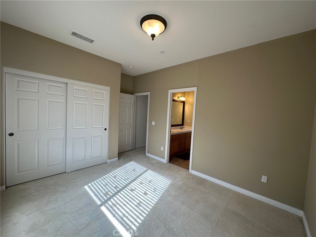 5588 California Oak Street Simi Valley, CA 93063 - Photo 28 of 38 a view of a hallway to a room