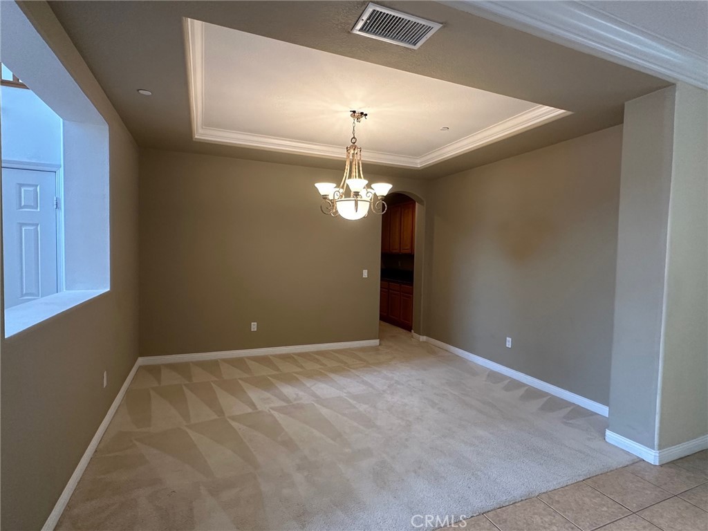 5588 California Oak Street Simi Valley, CA 93063 - Photo 3 of 38 a view of an empty room with a chandelier fan