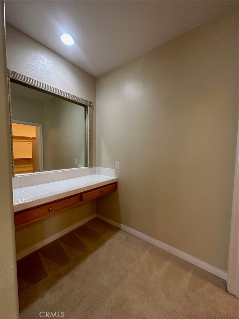 5588 California Oak Street Simi Valley, CA 93063 - Photo 33 of 38 a bathroom with a sink and a mirror