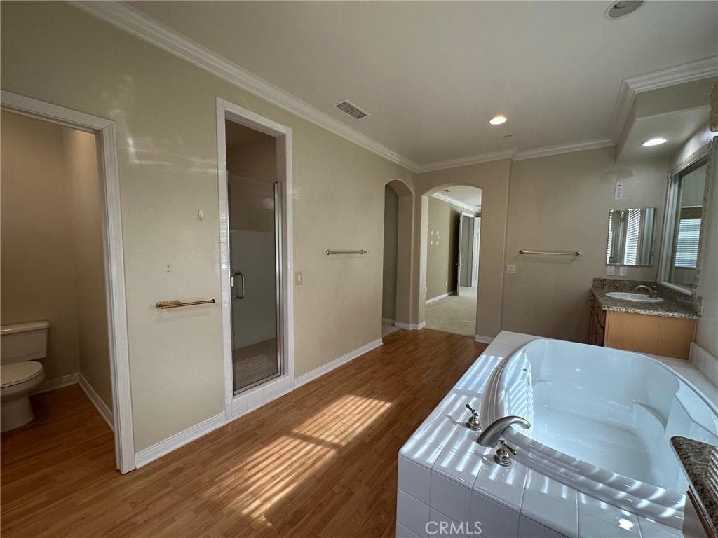 5588 California Oak Street Simi Valley, CA 93063 - Photo 34 of 38 a bedroom with a bed and a view of bathroom