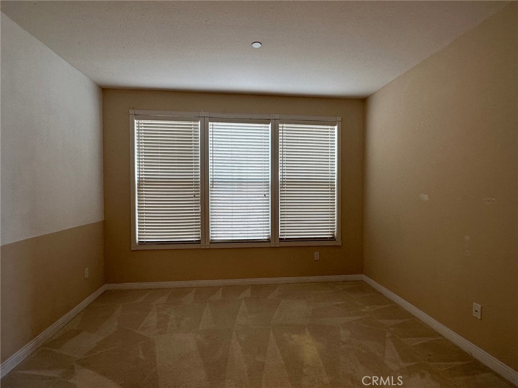 5588 California Oak Street Simi Valley, CA 93063 - Photo 4 of 38 an empty room with a window