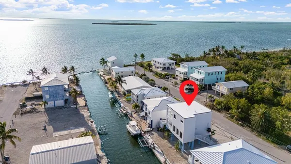 an aerial view of multiple house