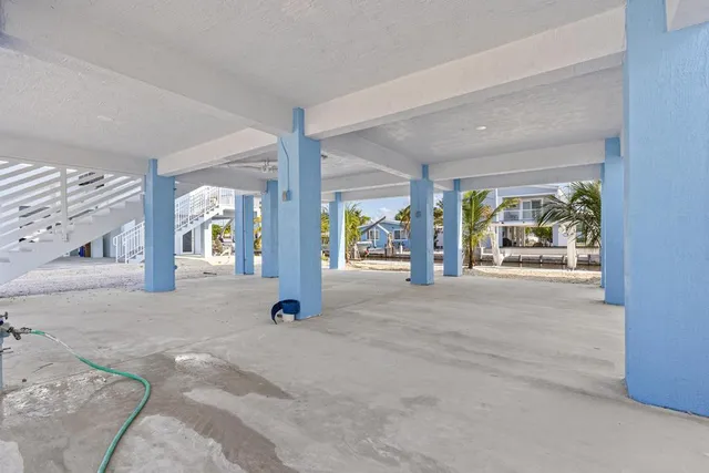 a view of a room with balcony and garden