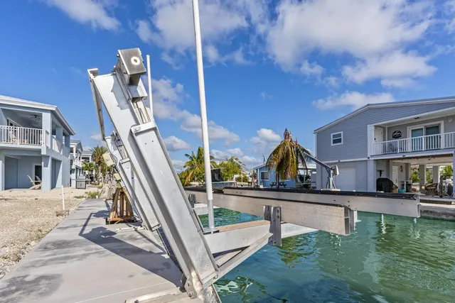 an aerial view of a house having patio