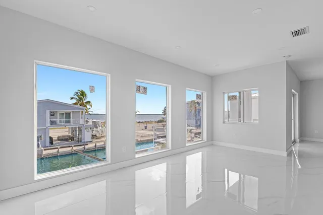 a view of an empty room and window