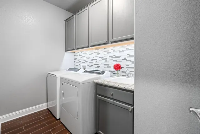 a utility room with dryer and washer