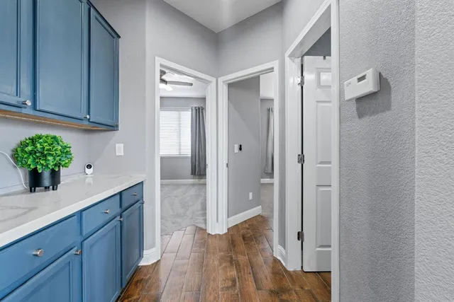 a bathroom with a sink and mirror