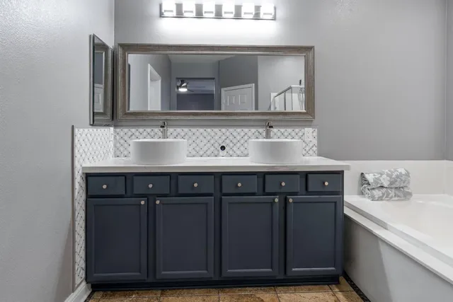 a view of a sink and a mirror