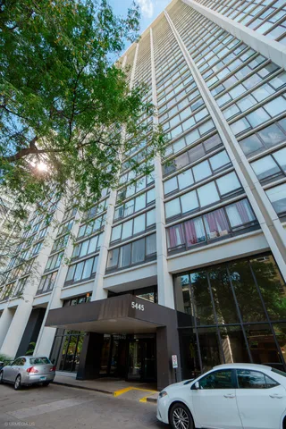 a front view of a building with street view