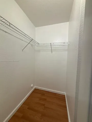 a view of a room with racks on the wall