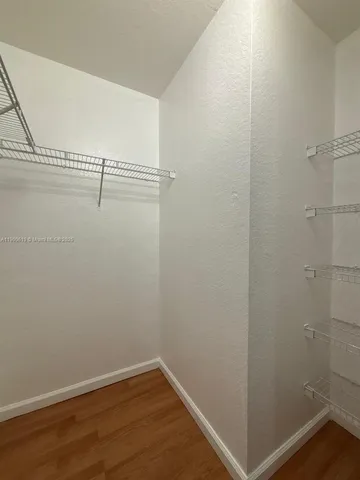 a view of small space with racks on the wall